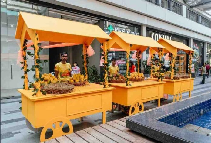 Screenshot2025-05-30171559 ATM All Things Mango, Reach 3Roads Gurugram, Mango Festival Gurugram, Gurugram Events, Sodhi's Super Market, Summer Carnival Gurugram, Mango Varieties, Family Fun Gurugram, Kids Activities Gurugram, Mango Eating Contest, Live Band Performance Gurugram, Sector 70 Gurugram, Community Event Gurugram, Food Festival Gurugram, Fruity Fiesta, Mango Mocktails, Gurugram Lifestyle, Retail Destination Gurugram, Seasonal Events India,